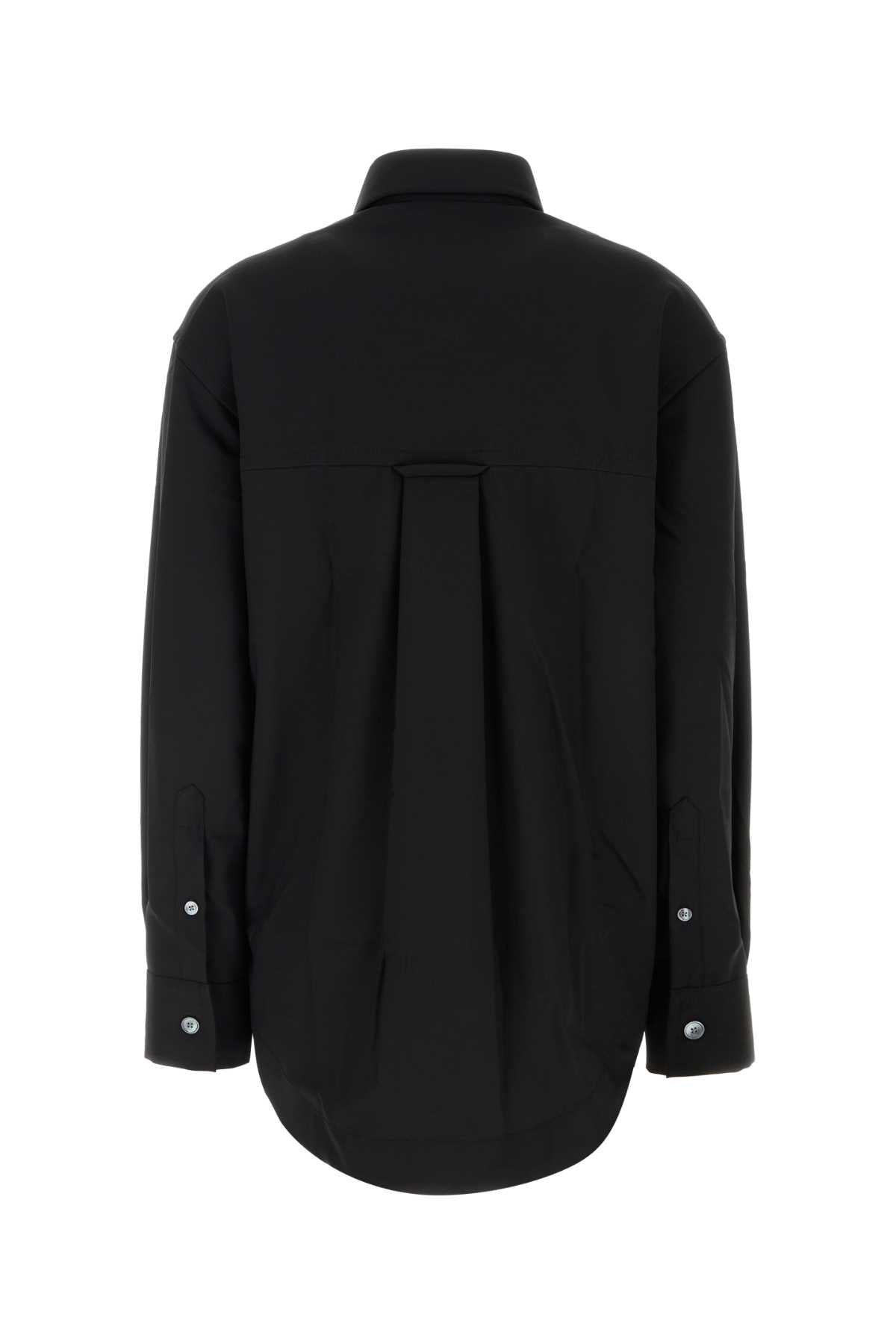 Ami Long sleeve wide shirt with sharp collar and embos