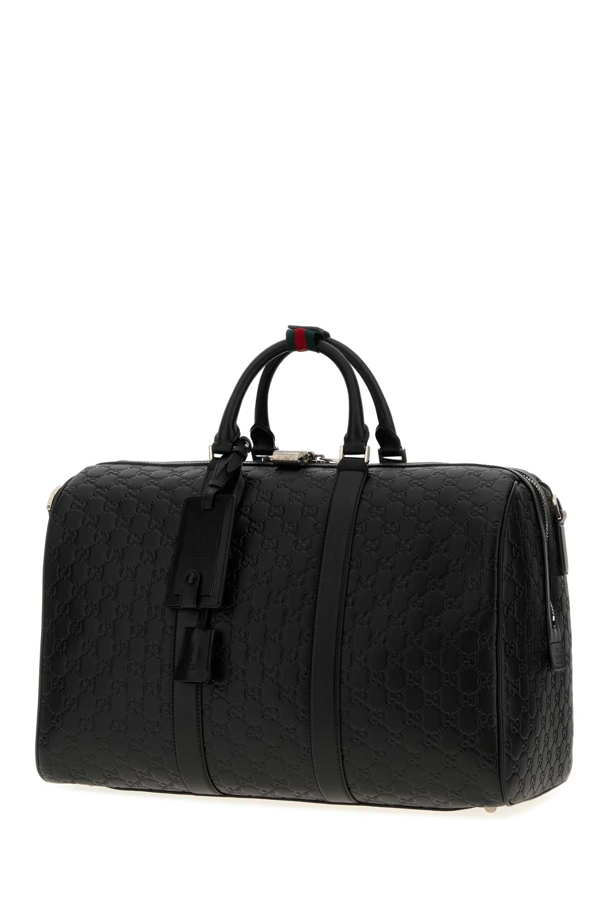 Gucci Duffle with shoulder, address and keys tag, padloc