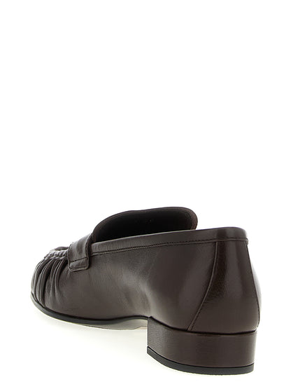 Curled toe moccasins Loafers
