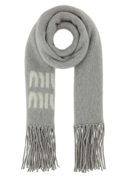 SCIARPE SCARFS AND FOULARDS