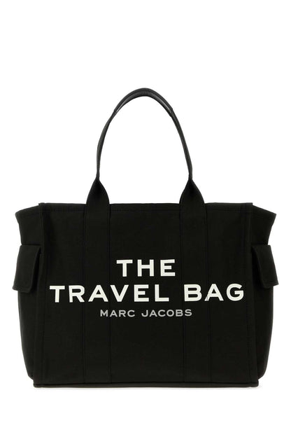 THE TRAVEL TOTE CROSSBODY BAGS