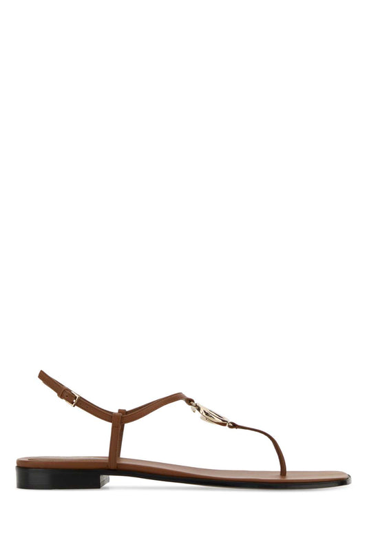 LEATHER UPPER AND SOLE THONG SANDALS