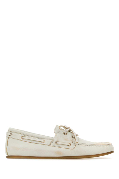 LEATHER UPPER AND RUBBER SOLE MOCCASIN LOAFERS