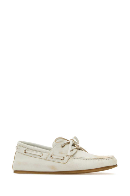 LEATHER UPPER AND RUBBER SOLE MOCCASIN LOAFERS