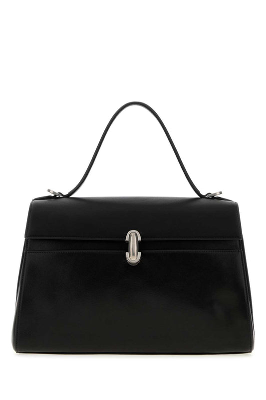 SOFT SYMMETRY IN VINTAGE CALF LEATHER HANDBAGS