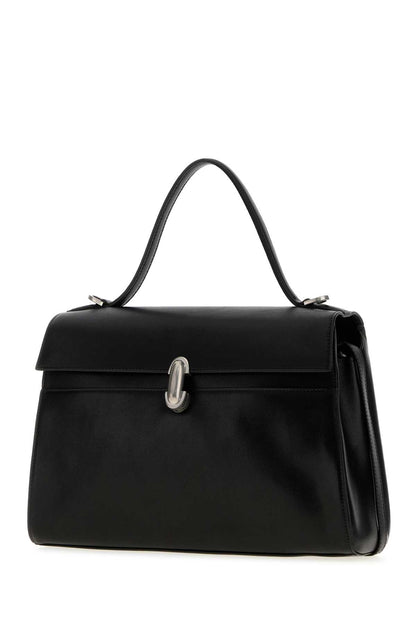 SOFT SYMMETRY IN VINTAGE CALF LEATHER HANDBAGS