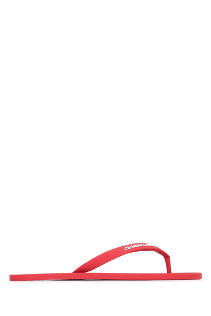 THE CHRISTIAN LOUBOUTIN SUMMER FLAT SLIPPERS