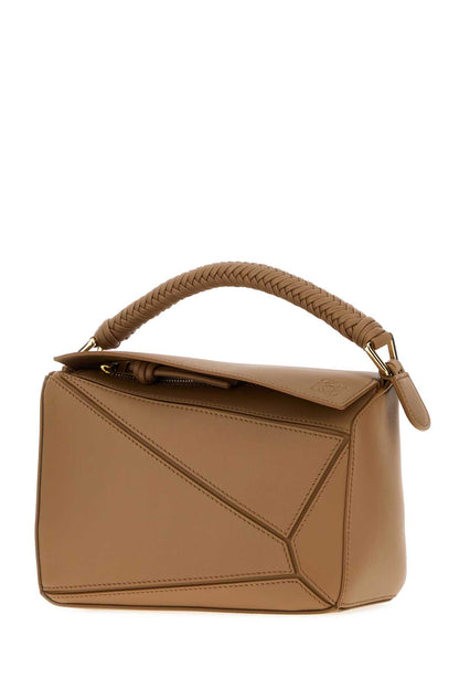 PUZZLE S WOVEN HANDLE HANDBAGS