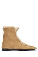 Toteme Shearling-edge winter boots