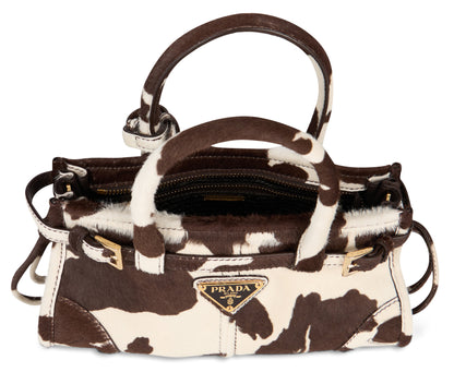 Prada Bonnie mini handbag in printed leather BAGS