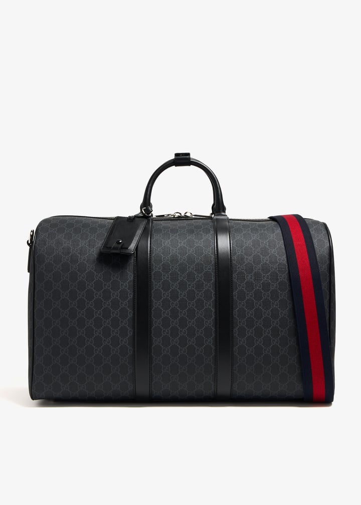Gucci Duffle with shoulder, address and keys tag removab