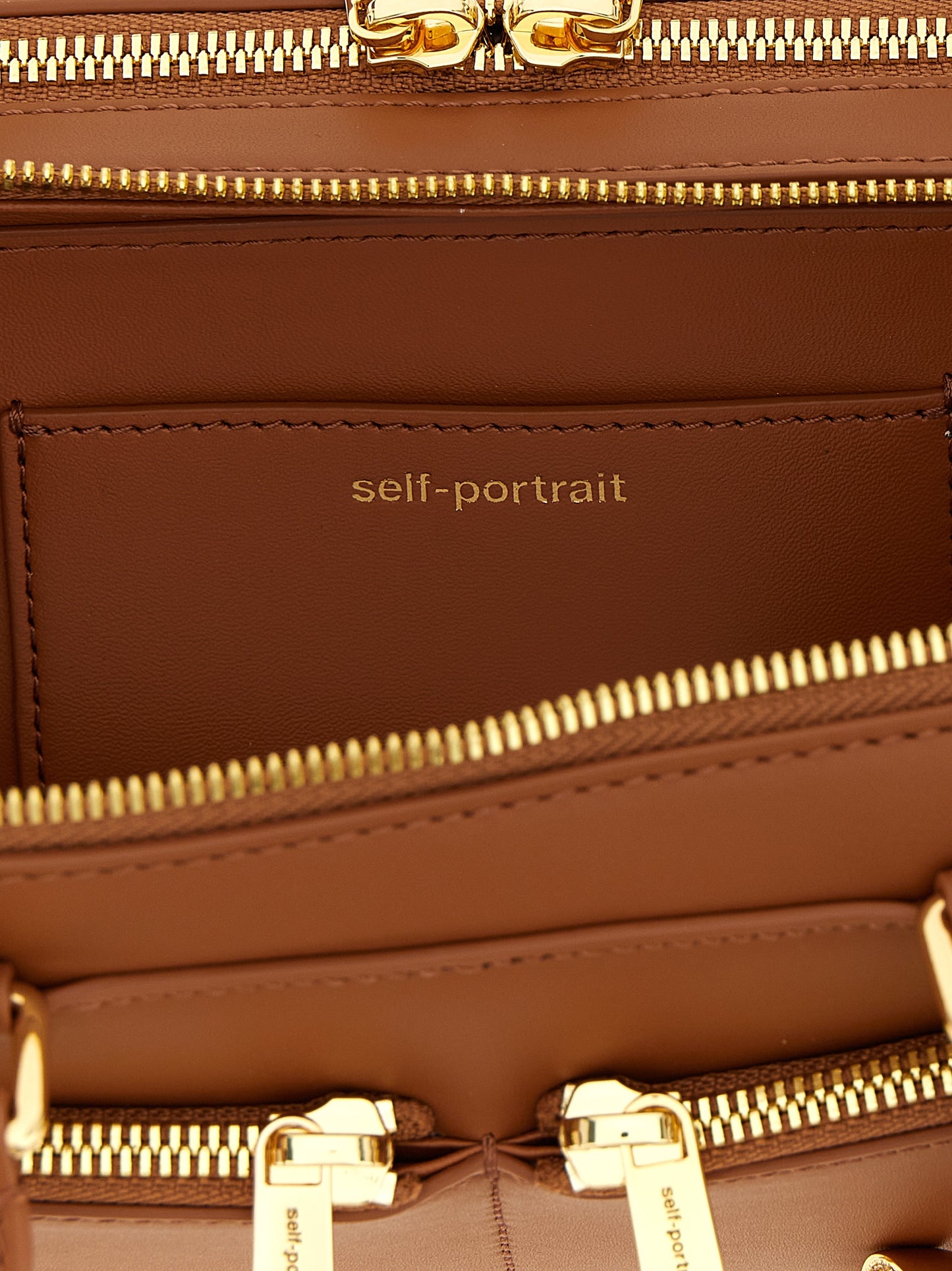 'Tan leather baguette with charm' shoulder bag Shoulder bags