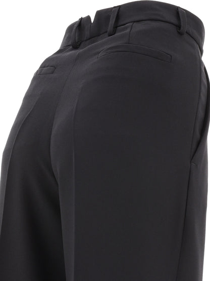 Tailored trousers with pressed crease Trousers