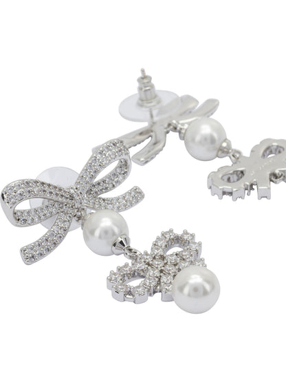Earrings with bows and pearls Jewels