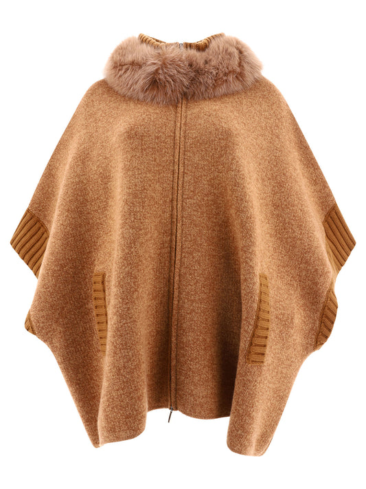 Cape with fur inserts Jackets and Coats
