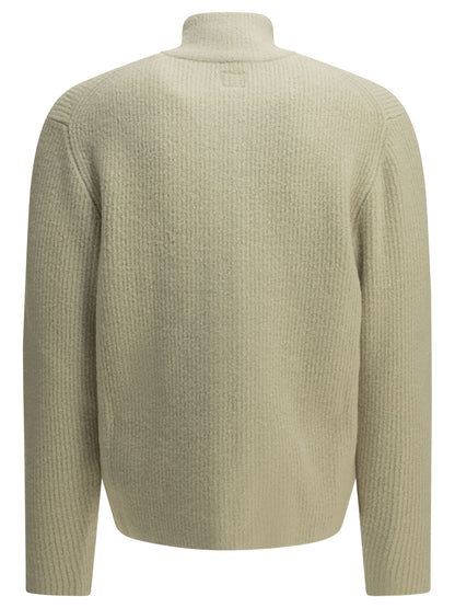Zip-up sweater in bouclé wool Knitwear