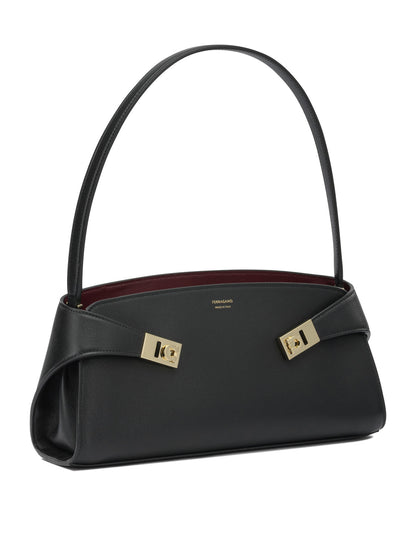 "Hug East-West" medium shoulder bag Shoulder bags
