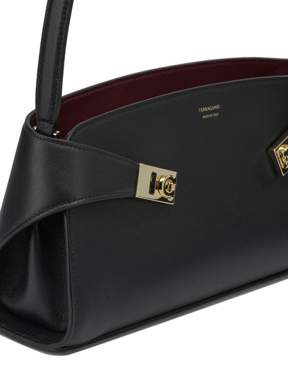 "Hug East-West" medium shoulder bag Shoulder bags