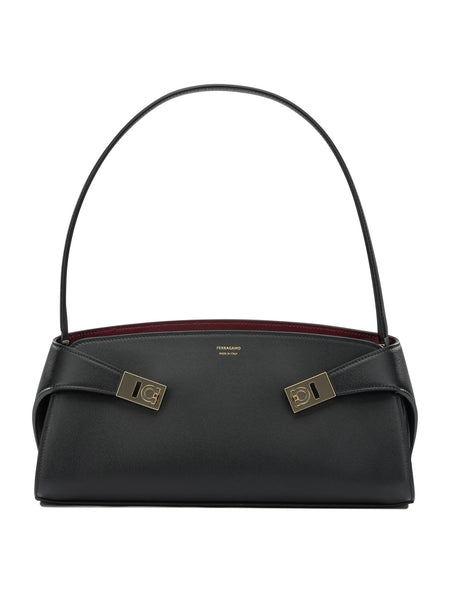 "Hug East-West" medium shoulder bag Shoulder bags