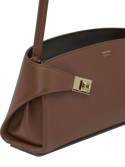 "Hug East-West" medium shoulder bag Shoulder bags