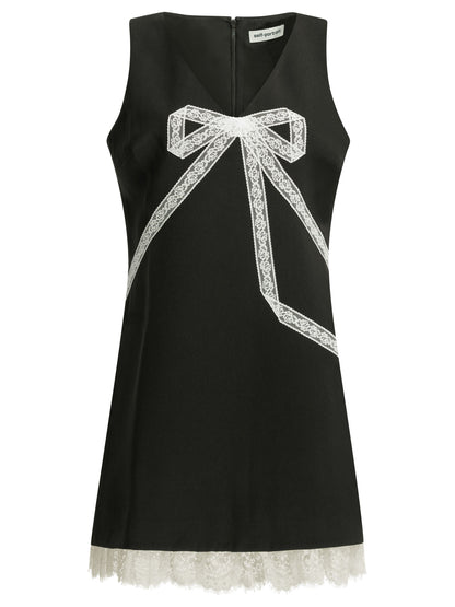Short sheath dress with bow Dresses