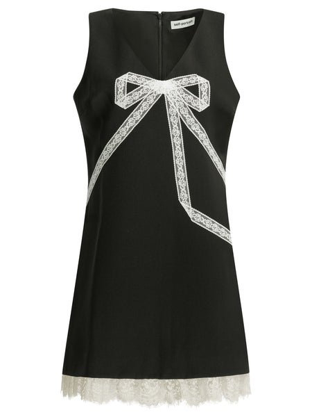 Short sheath dress with bow Dresses